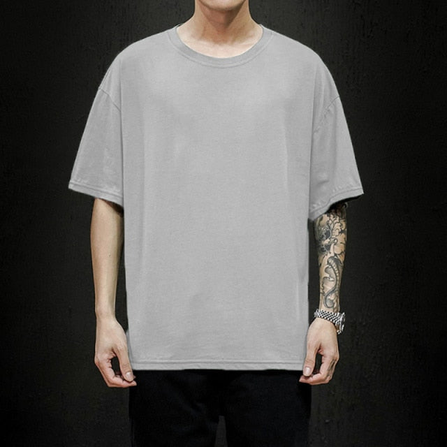 Men's pure cotton t-shirt by Antonios, featuring a soft, durable fabric with stylish hem and rounded sleeves.