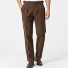 Men's Cotton-Blend Cuffed Pleated Trousers — Dark Brown, worn by a model