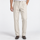 Men's Cotton-Blend Cuffed Pleated Trousers — White, worn by a model