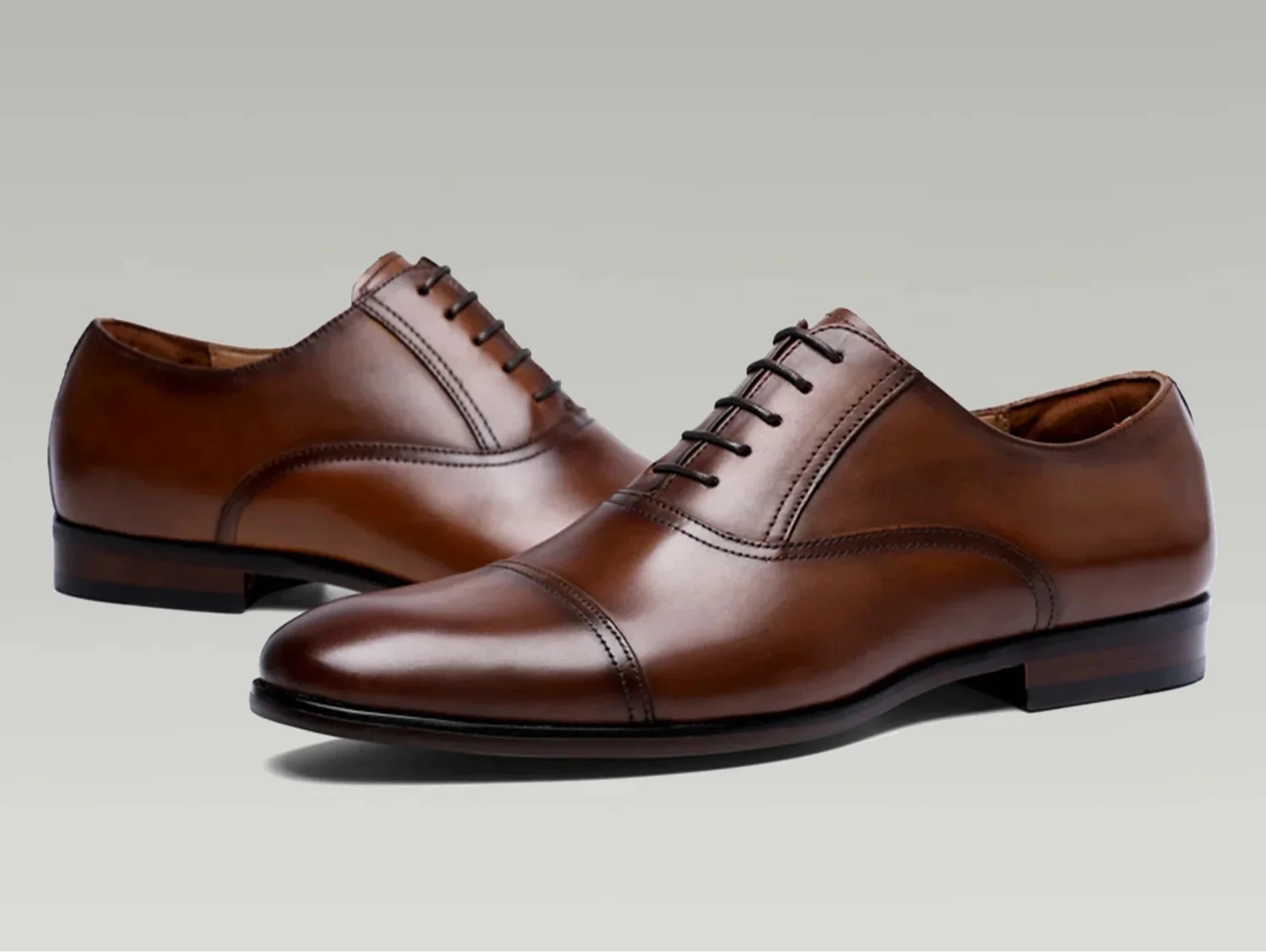 Brown formal British business shoes made of genuine leather, ideal for men seeking professional style.