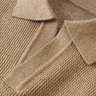 Close-up of beige fabric with a textured pattern