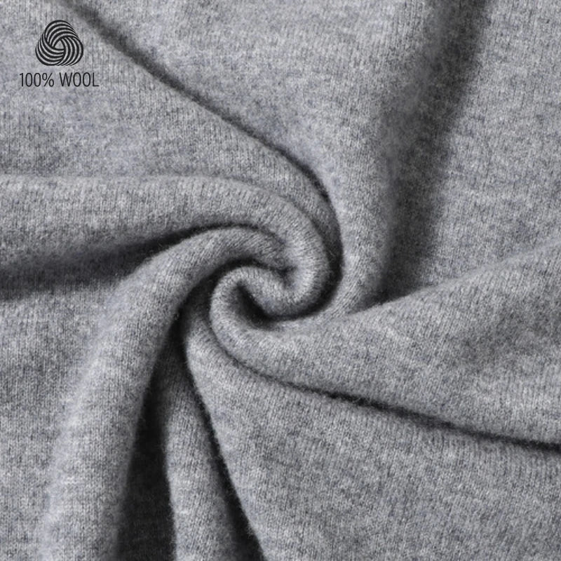 Close-up of heather gray wool fabric draped in a spiral, with a small '100% WOOL' logo in the upper left corner.