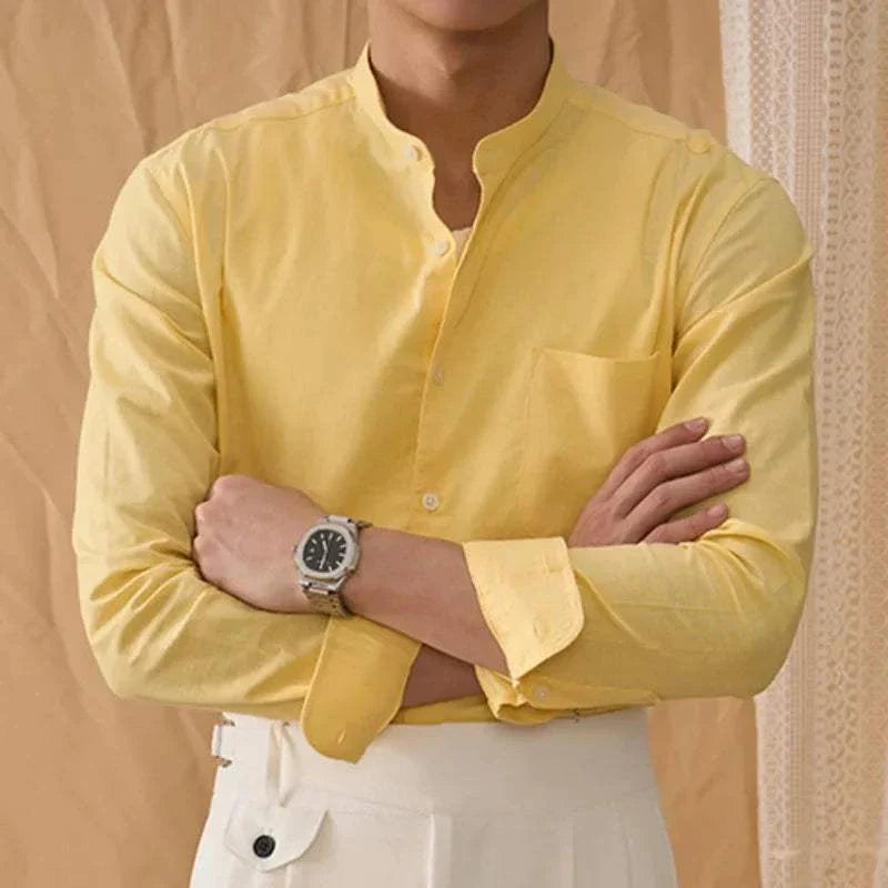 Antonios cotton-linen long sleeve shirt in yellow worn by a male model.