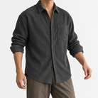 Relaxed corduroy shirt with a curved hem in charcoal, front model view