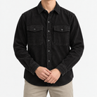 Washed cotton corduroy double pocket shirt in black, front model view