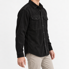 Washed cotton corduroy double pocket shirt in black, three-quarter model view