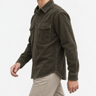 Washed cotton corduroy double pocket shirt in olive green, three-quarter model view