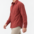 Cotton point collar shirt with a chest pocket in brick red, three-quarter model view