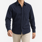 Cotton point collar shirt with a chest pocket in navy blue, front model view