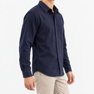 Cotton point collar shirt with a chest pocket in navy blue, three-quarter model view