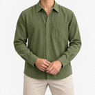 Cotton point collar shirt with a chest pocket in olive green, front model view