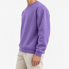 Heavyweight cotton crew neck sweatshirt in purple, three-quarter model view