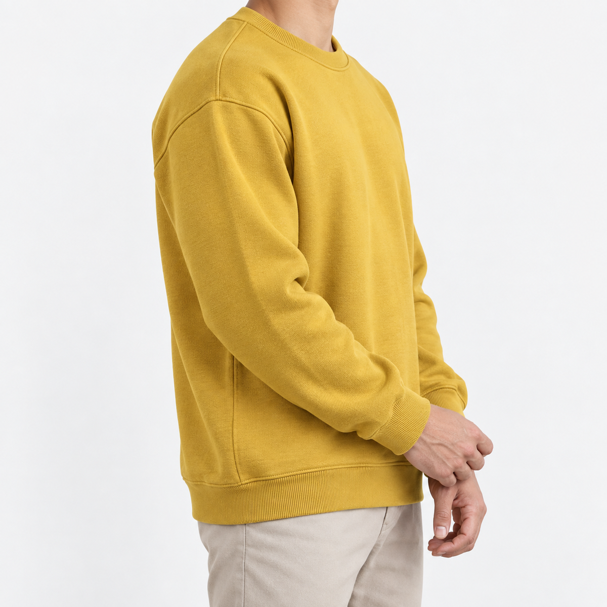 Heavyweight cotton crew neck sweatshirt in mustard, three-quarter model view