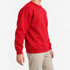 Heavyweight cotton crew neck sweatshirt in red, three-quarter model view
