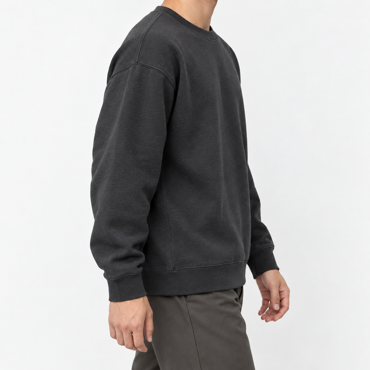 Heavyweight cotton crew neck sweatshirt in dark gray, three-quarter model view