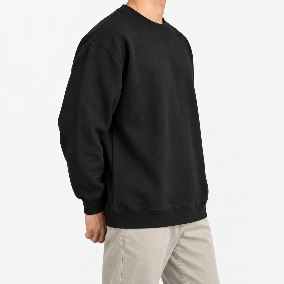 Heavyweight cotton crew neck sweatshirt in black, three-quarter model view