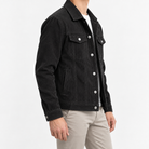 Cotton blend corduroy button front jacket in black, three-quarter model view
