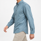 Brushed stripe shirt with a button down collar in blue stripe, three-quarter model view