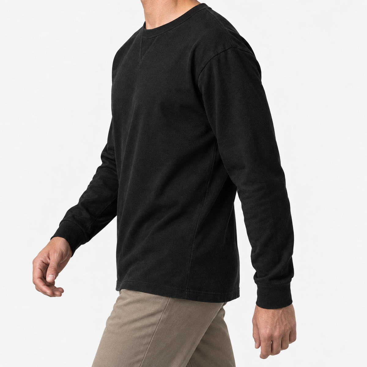 Washed cotton long sleeve jersey top in black, three-quarter model view