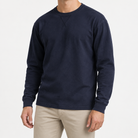 Washed cotton long sleeve jersey top in navy blue, front model view