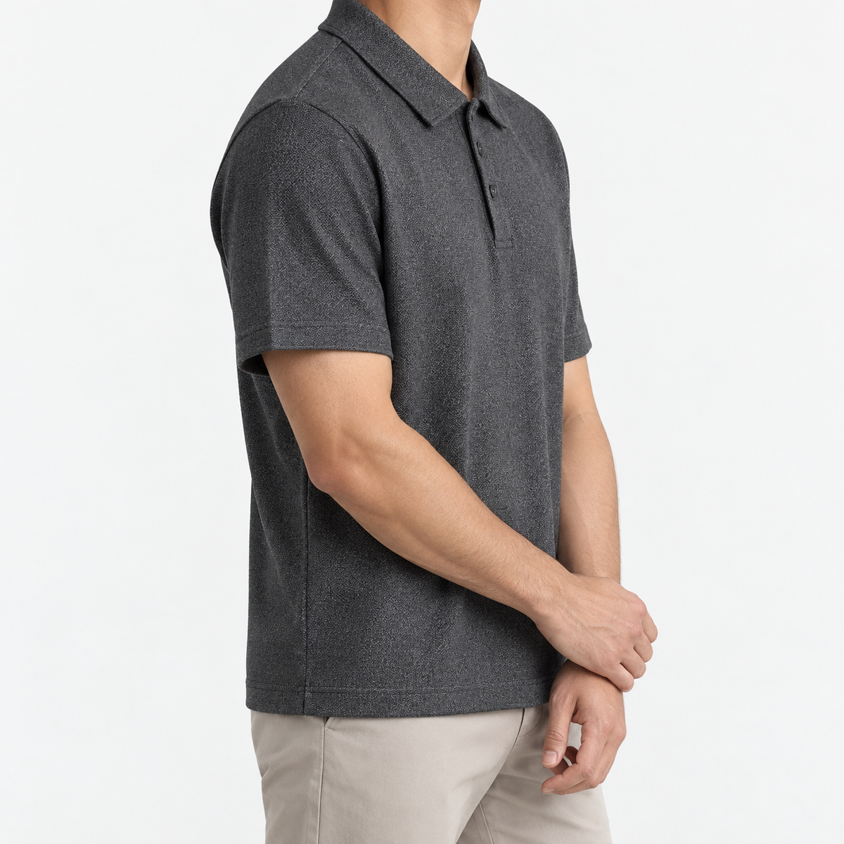 Textured lyocell short sleeve knit polo in charcoal, three-quarter model view