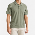Textured lyocell short sleeve knit polo in sage green, front model view