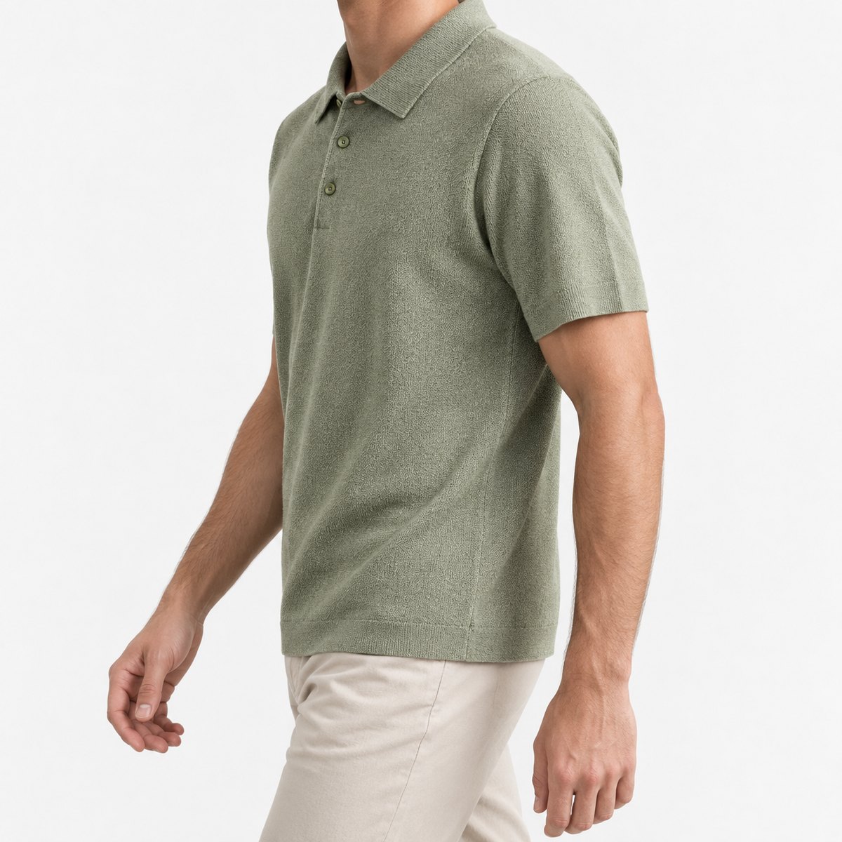 Textured lyocell short sleeve knit polo in sage green, three-quarter model view