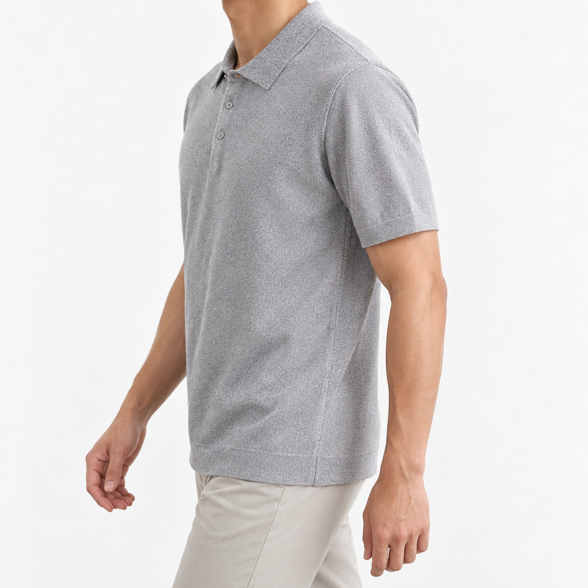 Textured lyocell short sleeve knit polo in light gray, three-quarter model view