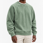 Ribbed raglan sweatshirt with a stitched neckline in sage green, front model view