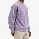 Ribbed raglan sweatshirt with a stitched neckline in lilac, three-quarter model view