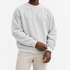 Ribbed raglan sweatshirt with a stitched neckline in off-white, front model view