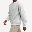 Ribbed raglan sweatshirt with a stitched neckline in off-white, three-quarter model view
