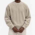 Ribbed raglan sweatshirt with a stitched neckline in beige, front model view