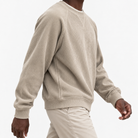 Ribbed raglan sweatshirt with a stitched neckline in beige, three-quarter model view
