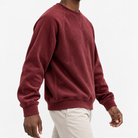 Ribbed raglan sweatshirt with a stitched neckline in wine red, three-quarter model view