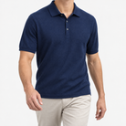 Lyocell silk polo with a fine textured knit in navy blue, front model view