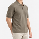 Lyocell silk polo with a fine textured knit in taupe, three-quarter model view