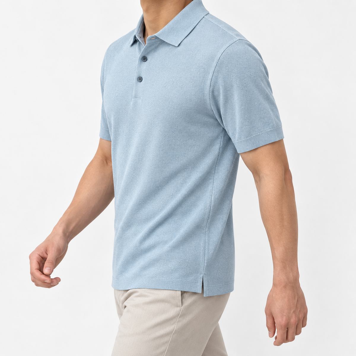 Lyocell silk polo with a fine textured knit in light blue, three-quarter model view