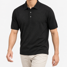 Lyocell silk polo with a fine textured knit in black, front model view