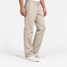 Washed cotton straight trousers with welt pockets in light khaki, three-quarter model view