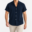 Short-sleeved cotton summer golf t-shirt in dark blue, front model view