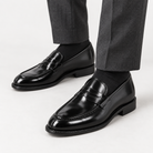 Leonardo shiny genuine leather loafers in black, side worn view