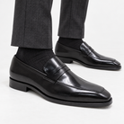 Leonardo formal office loafers in black, side worn view