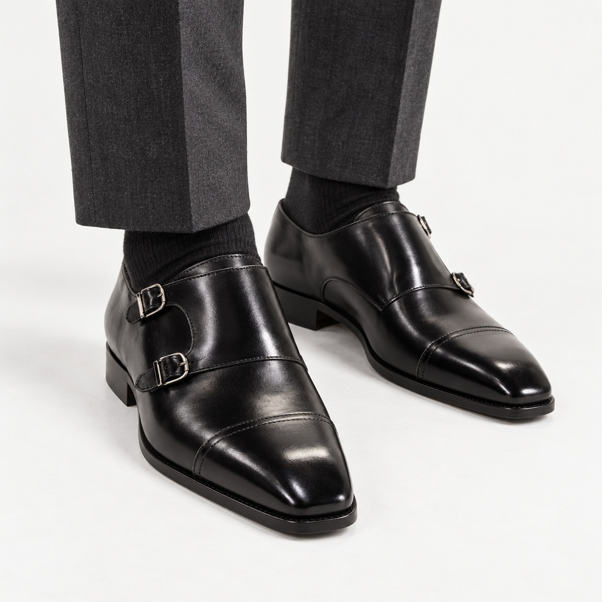 Leonardo double buckle leather shoes in black, front worn view