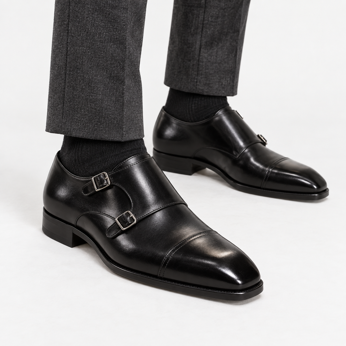 Leonardo double buckle leather shoes in black, side worn view