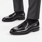 Leonardo classic slip luxury shoes in black, side worn view