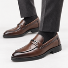 Leonardo slip-on business loafers in brown, side worn view