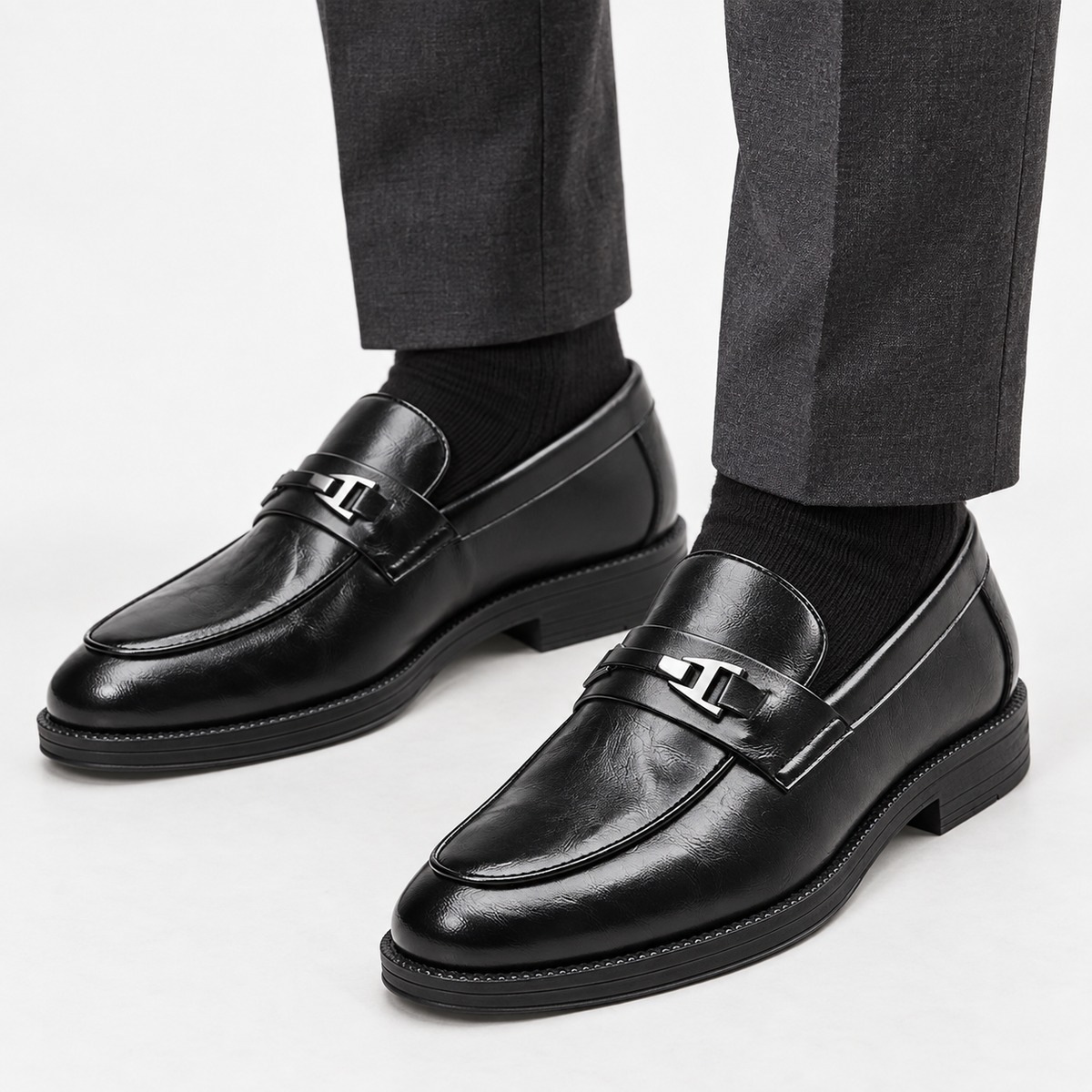 Leonardo slip-on business loafers in black, front worn view