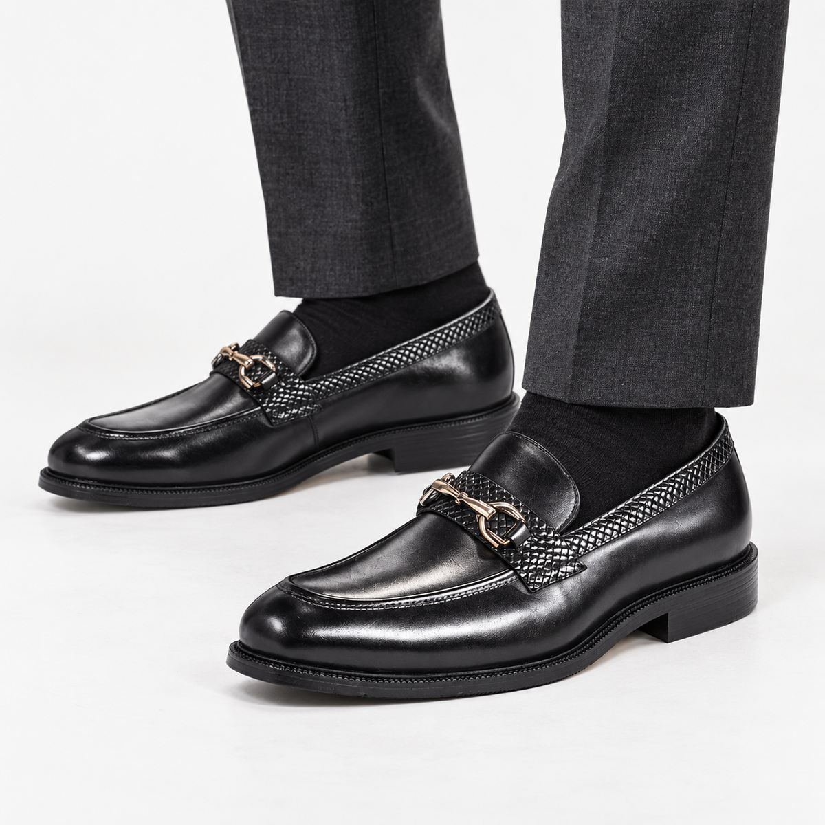 Leonardo metal buckles business loafers in black, side worn view