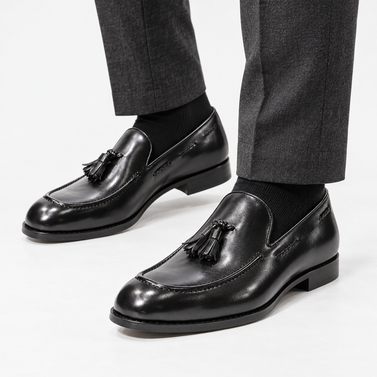 Leonardo italian style tassel loafers in black, side worn view